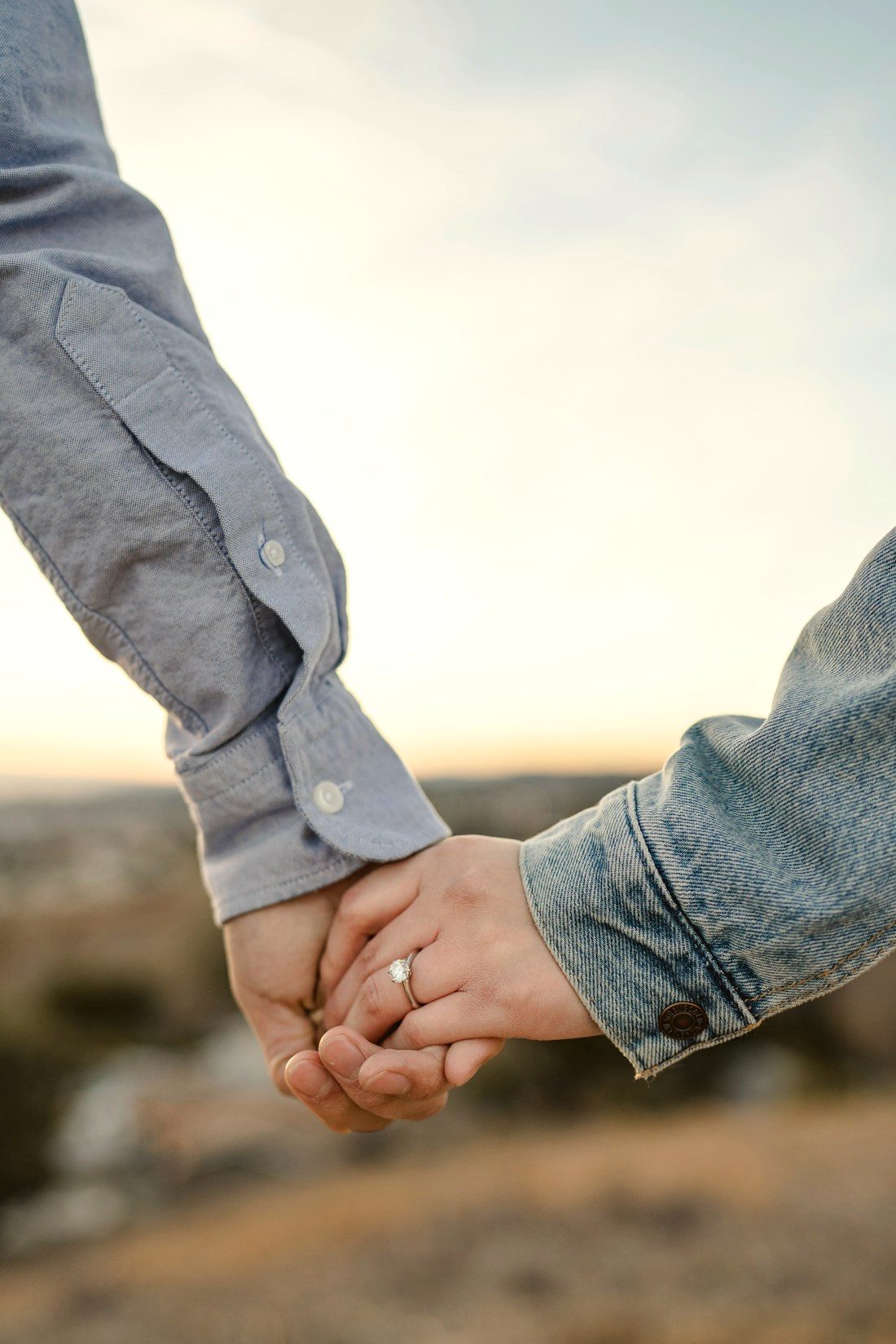 A couple embracing in soft, romantic light