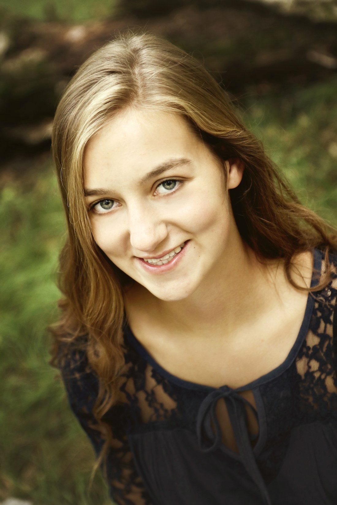 A senior portrait with a warm, editorial feel